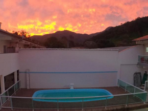 APARTAMENTO COM PISCINA E CHURRASQUEIRA